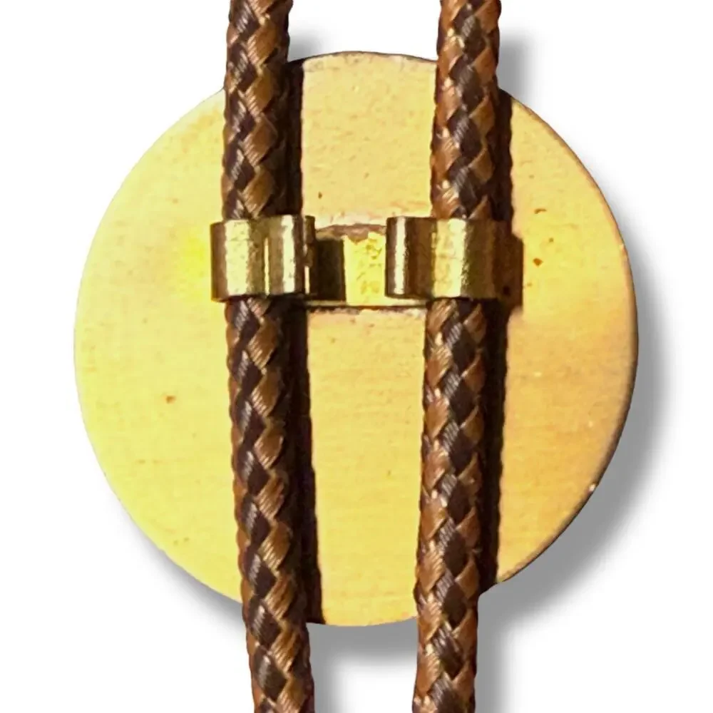 Vintage Hawaiian Bolo Tie Mens Coastal Cowboy Brass 3D Medallion Fabric Chord